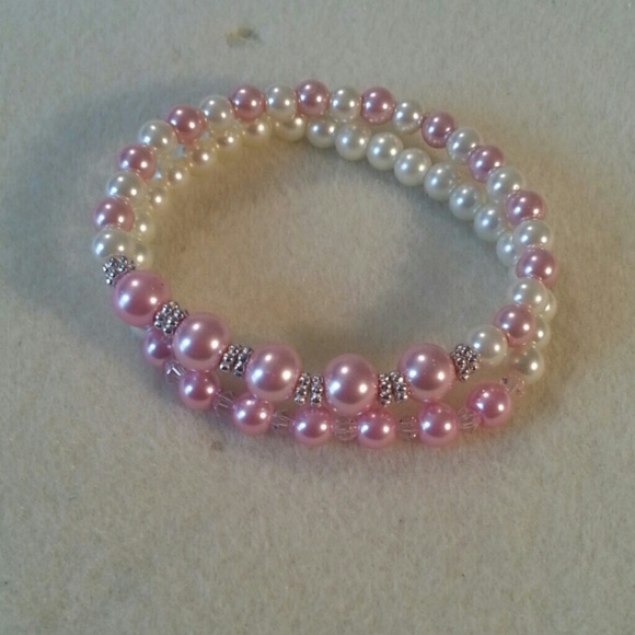 Womens pink and white pearl bracelets