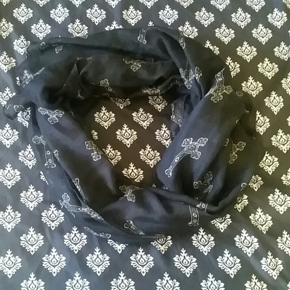 Black scarf or shall with crosses on it