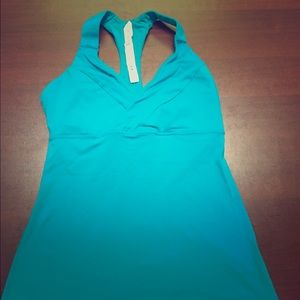 Size 4 turquoise lululemon workout top.