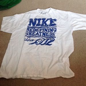 White and royal blue Nike t-shirt.
