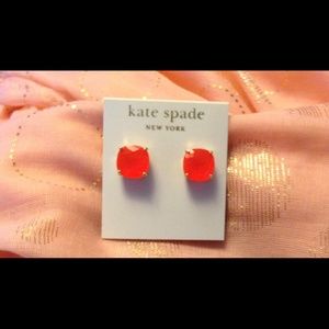 Large Kate Spade earrings; neon orange color