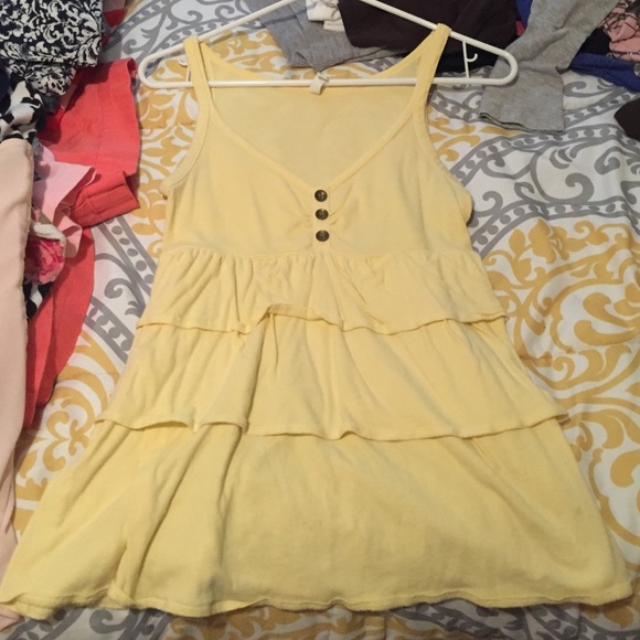 Yellow ruffled tank