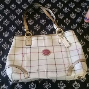 White and tan and magenta coach purse