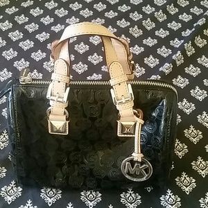 Black and tan Michael kors bag