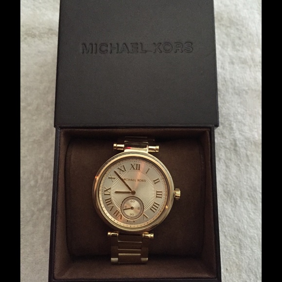SOLD MK gold watch