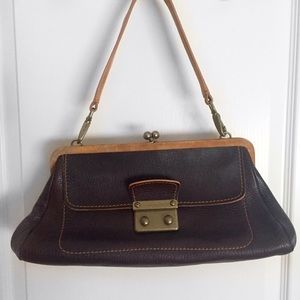 Authentic brown leather Miu Miu purse.