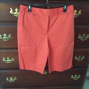 Cute tangerine colored Bermuda shorts