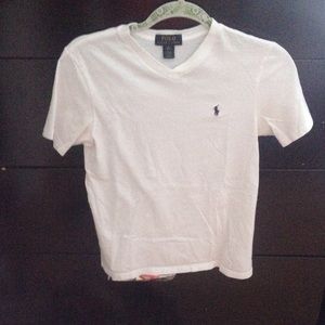 white and navy blue v-neck polo