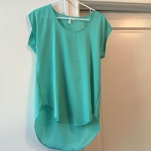 Teal blouse.