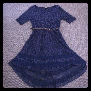 Navy blue high-low dress with accent belt.
