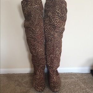 Over the knee cheetah print boots