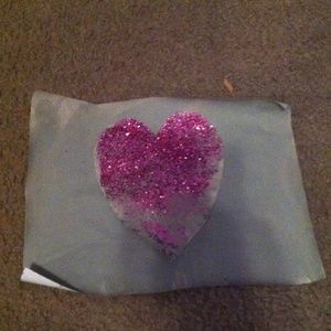 Grey paper background/pink glittered ombre heart