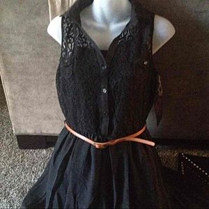 Black dress with belt.