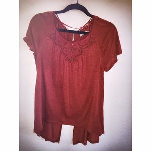 Dark pink/purple top with slit halfway up back