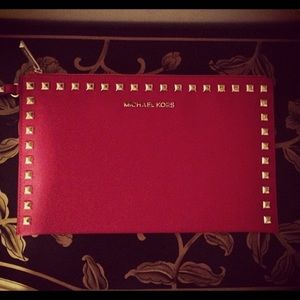 MK studded red clutch