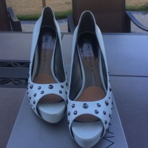 Studded white Marc Fisher™ heels.
