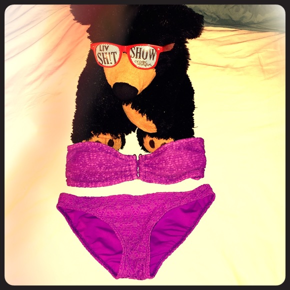 A pink/purple Apollo bikini that is a size medium. - Picture 1 of 4