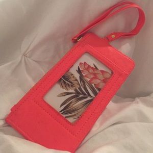 Neon pink wristlet wallet