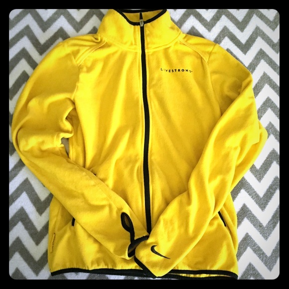 NIKE Livestrong yellow zip up size med runs big