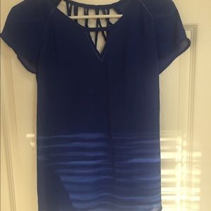 gorgeous blue top with open back detailing