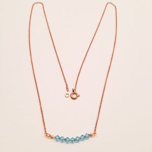 swarovski crystal.delicate gold & blue aquamarine
