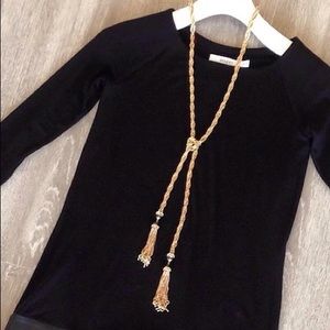 Gorgeous long gold necklace with tassels