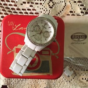 White and silver Fossil watch