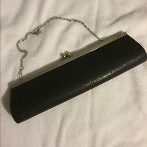 Shimmery black clutch bag