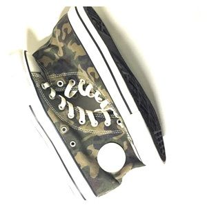 High top Chuck Taylors/ Converse