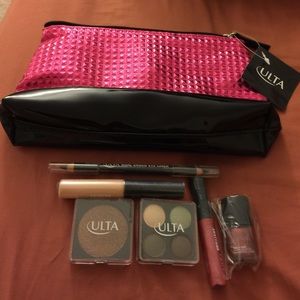 7 pieces Ulta beauty products with make up bag