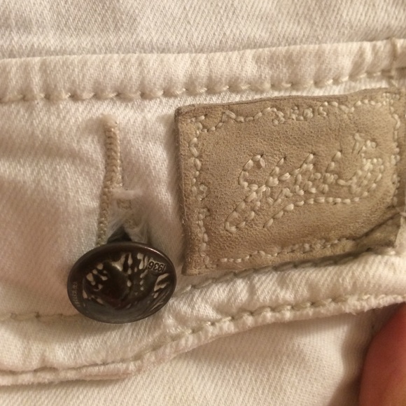 White boot cut Cherokee stitches denim size 27