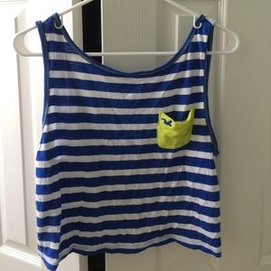 blue and white striped top with green pocket