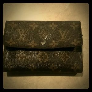 Authentic Vintage Louis Vuitton wallet.