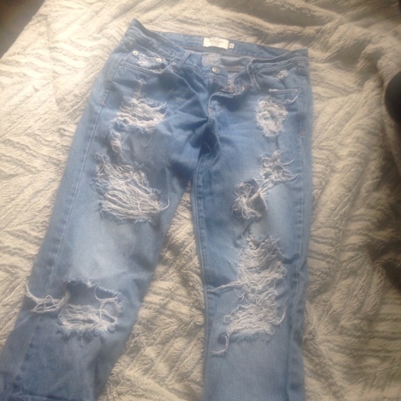 Distressed boyfriend cut jeans