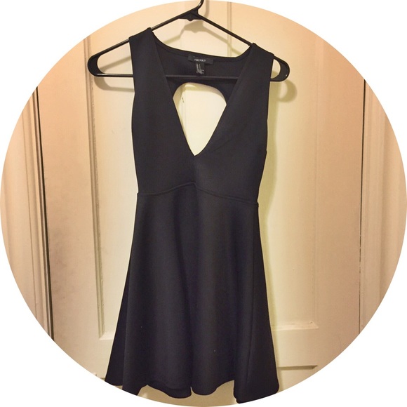 Super cute black dress! Cut out back