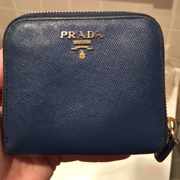 Prada wallet! With slight signs of wear