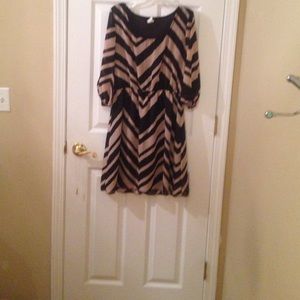 Beige and black dress