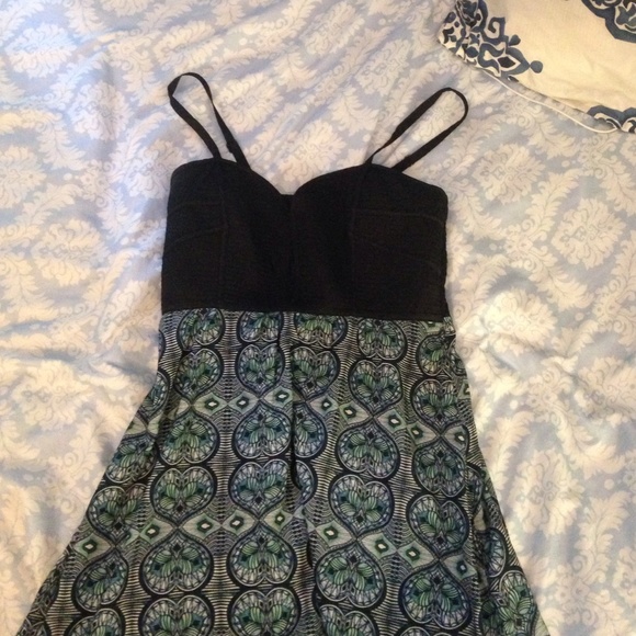 Dress with a black top and a blue and teal bottom