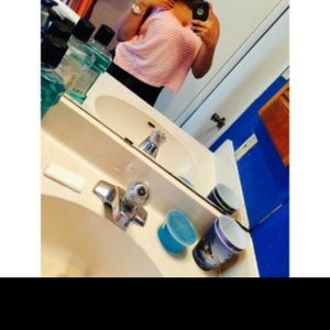 Striped shirt, has a bow in the back