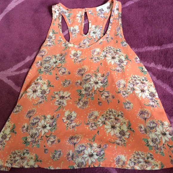Cute top I never wore because it never fit me