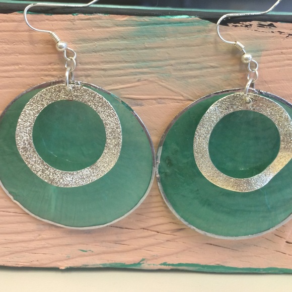 Teal shell earrings with silver design