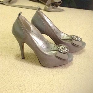 Grey peep toe high heels with a bow and pendant