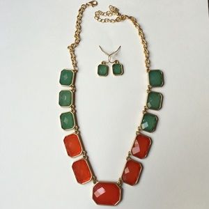 Green and orange necklace with matching earrings.