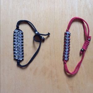 2 bracelets one red one black