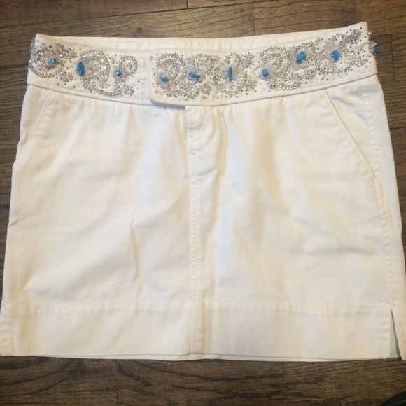 White skirt bejeweled with turquoise