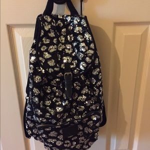 I am selling my VS sequin cheetah print backpack!