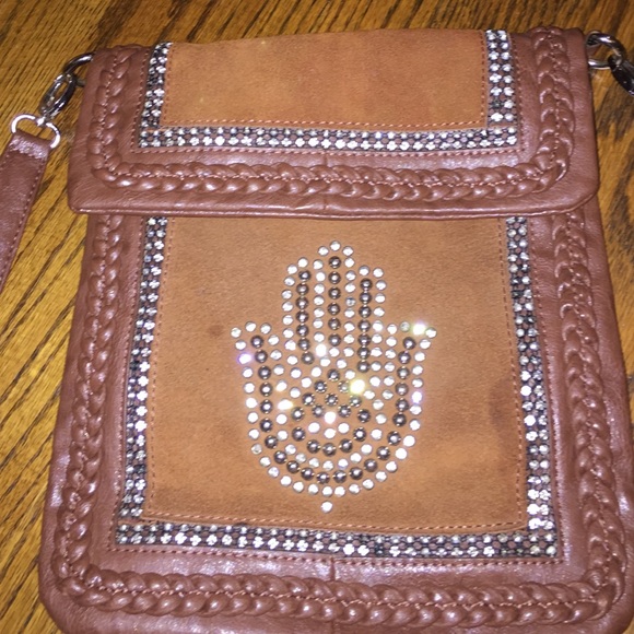 Good luck hamsa hand satchel.