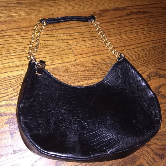 Black reptile skin handbag