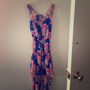 I am selling a short-long floral dress.