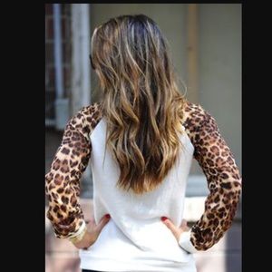 White shirt with cheetah sleeves